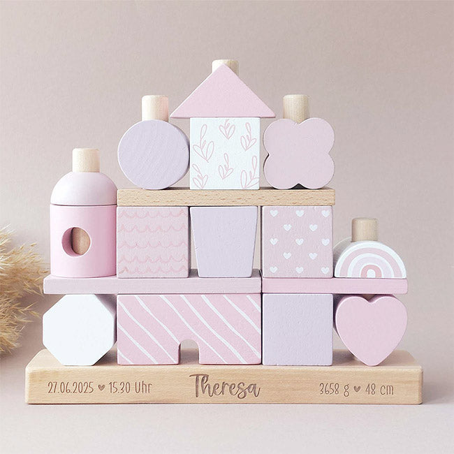 Personalisiertes Holzspielzeug als Geschenk für Taufe und Geburt