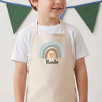 Kinderschürze (personalisierbar) mit Regenbogen für Jungen