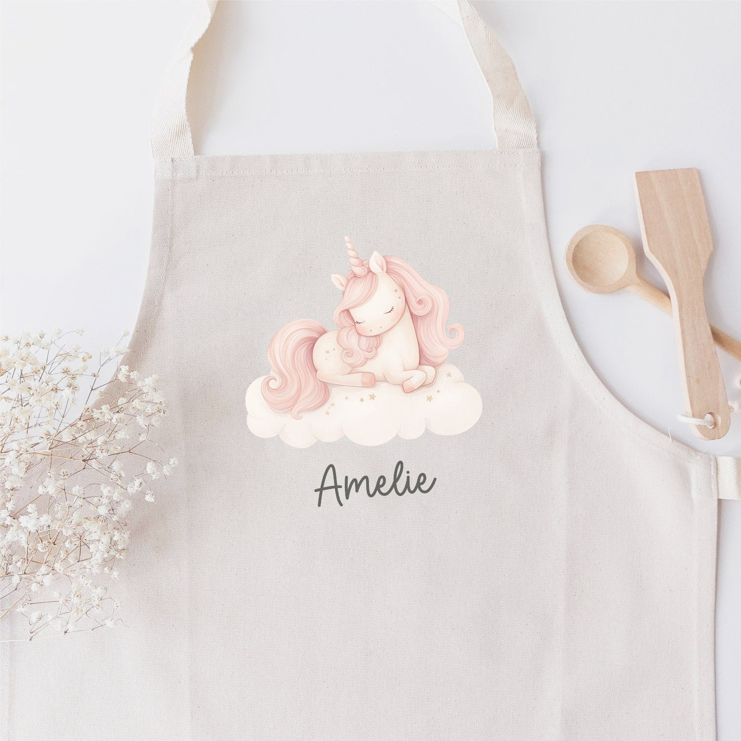 Kinderschürze mit farbigen Einhorn-Motiv und Name