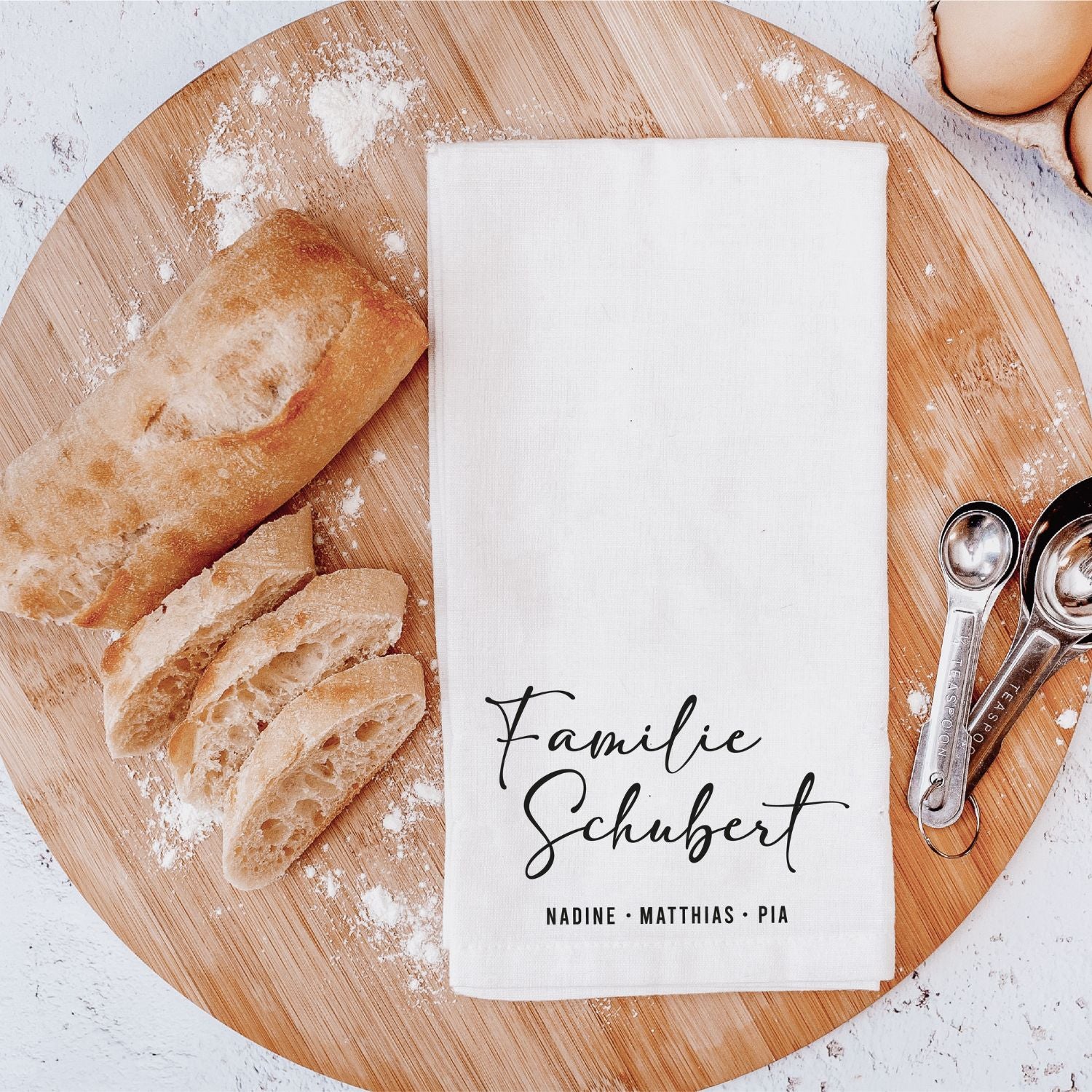 Geschirrtuch mit Aufdruck: "Familie + Familienname und 3 Vornamen" (Eltern + Kind)