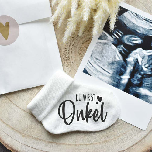 Geschenkidee: Babysocke "Du wirst Onkel", um dem Bruder deine Schwangerschaft zu verkünden